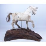 Carved wooden model of a horse, with traces of chalk/ lime finish, with horses hair tail,