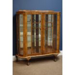 Mid 20th century walnut shaped front display cabinet, two glazed doors, mirrored interior, W102cm,