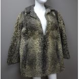 Vintage Persian lamb variegated medium length coat and a Vintage lamb wool medium length coat,