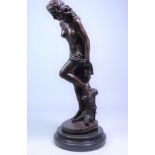 Contemporary bronze sculpture of a classical female figure, stood by tree stump, on marble plinth,