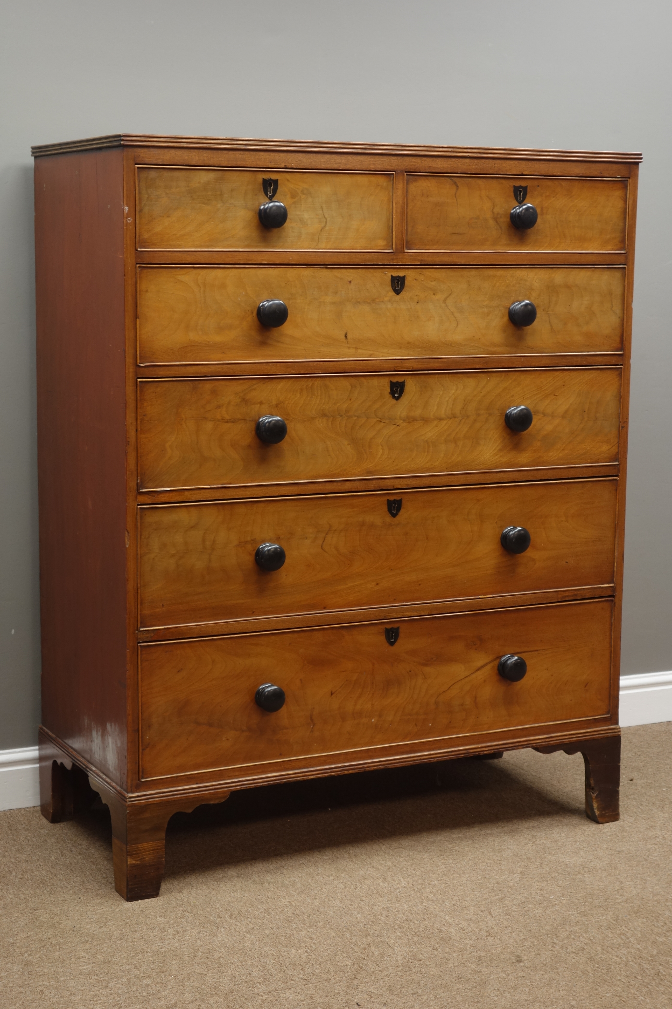 19th century mahogany chest, two short and four long drawers, turned ebonised handles, bracket feet,