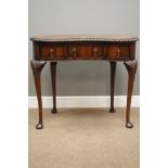 Early 20th century mahogany writing desk, kidney shaped top with gadroon moulding,