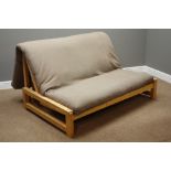 'Futon Company' two seat folding futon day bed, with upholstered loose cushions,