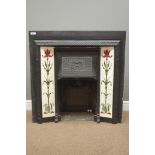 Traditional Victorian style 'Stovax' cast iron fireplace with tiled uprights,