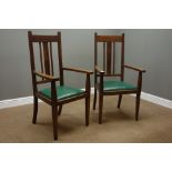 Pair Arts and Crafts period oak armchairs,