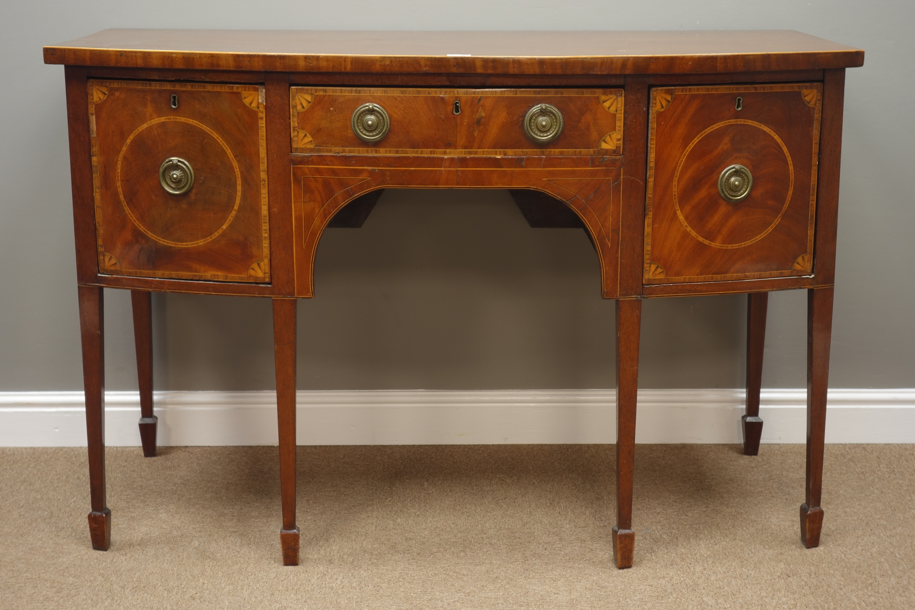 George III mahogany bow front sideboard, centre drawer, two cupboards,