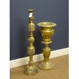 Eastern pierced brass floor standing candlestick and a vintage brass jardiniere,