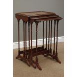 Late 20th century mahogany nest of three tables, turned supports, with gallery top, W53cm, H74cm,
