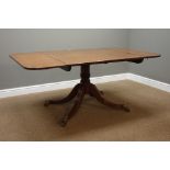 Regency period mahogany dining table, banded drop leaf top with rounded corners,