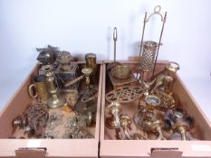 Brass model of a Blacksmith, brass wall sconces, trivet, lantern, figures, chamber sticks,