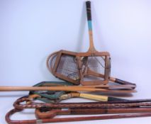 Three early 20th Century walking sticks with silver bands, two other walking sticks,