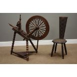 Turned beech spinning wheel and a carved spinning chair Condition Report <a