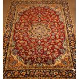 Persian Najafabad plumb ground rug carpet, with stylised scrolling floral field,
