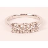 Three stone brilliant cut diamond platinum ring hallmarked D = 1.