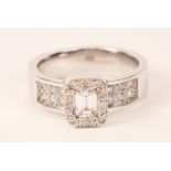 18ct white gold baguette and brilliant cut diamond cluster ring hallmarked central diamond approx .