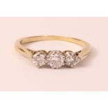 Three stone gold diamond ring tested to 18ct Condition Report <a href='//www.