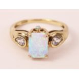 Opal and white topaz gold ring hallmarked 9ct Condition Report <a href='//www.