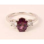 18ct white gold oval purple sapphire and round diamond three stone ring hallmarked Sapphire = 2.