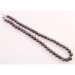 Black single strand freshwater pearl necklace with silver clasp stamped 925 Condition