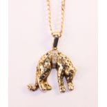 Gold and diamond African leopard pendant stamped 9ct on flattened link necklace chain stamped 9kt