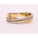 Double row diamond cross over gold ring stamped 18k Condition Report Ring size = K