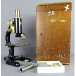 Black monocular microscope by Prior London No. 17372, with additional lens in fitted case