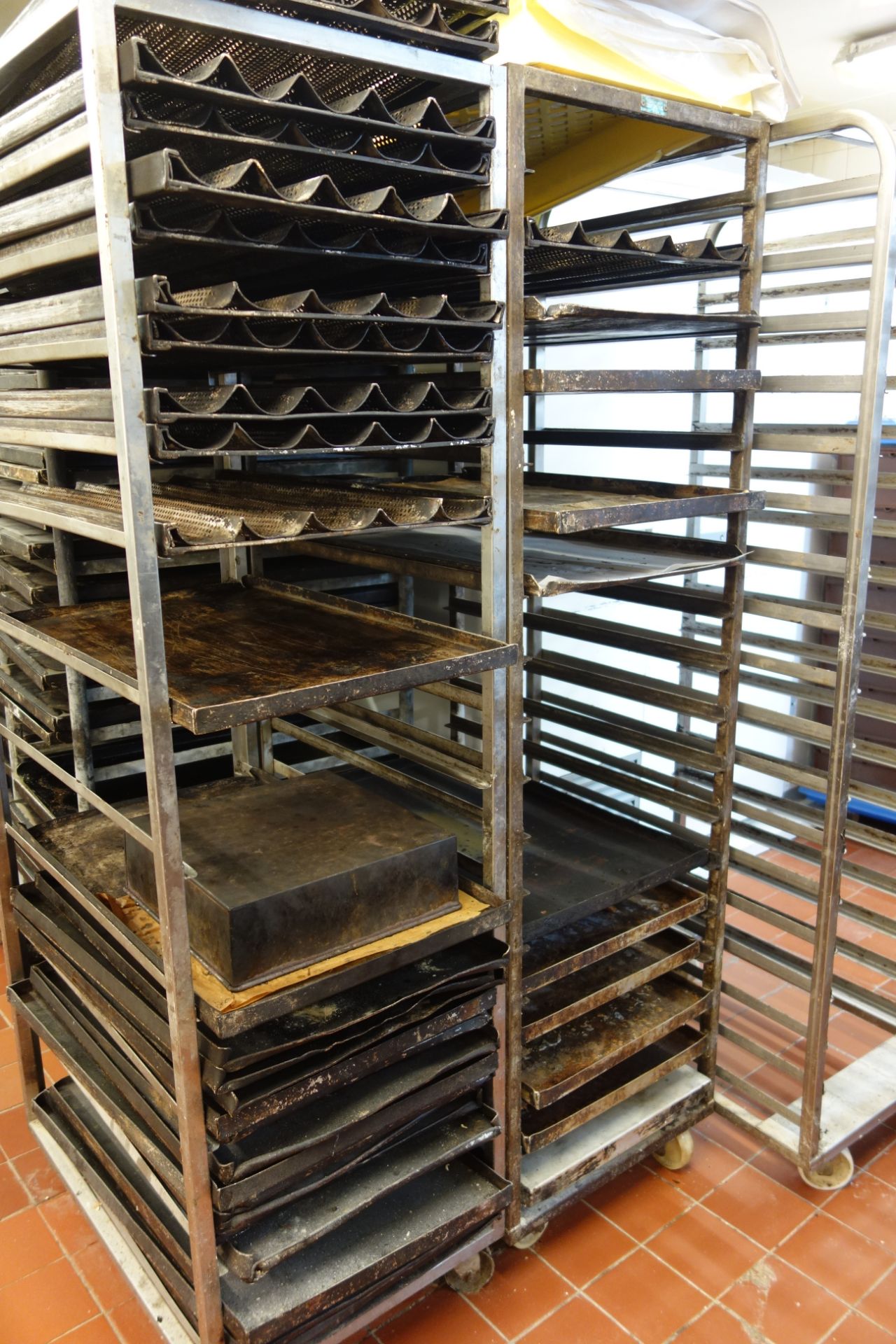 Eight commercial bakers rack stands/trolleys with approx.