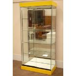 Glazed floor standing shop display cabinet with mirrored back and illuminated interior,