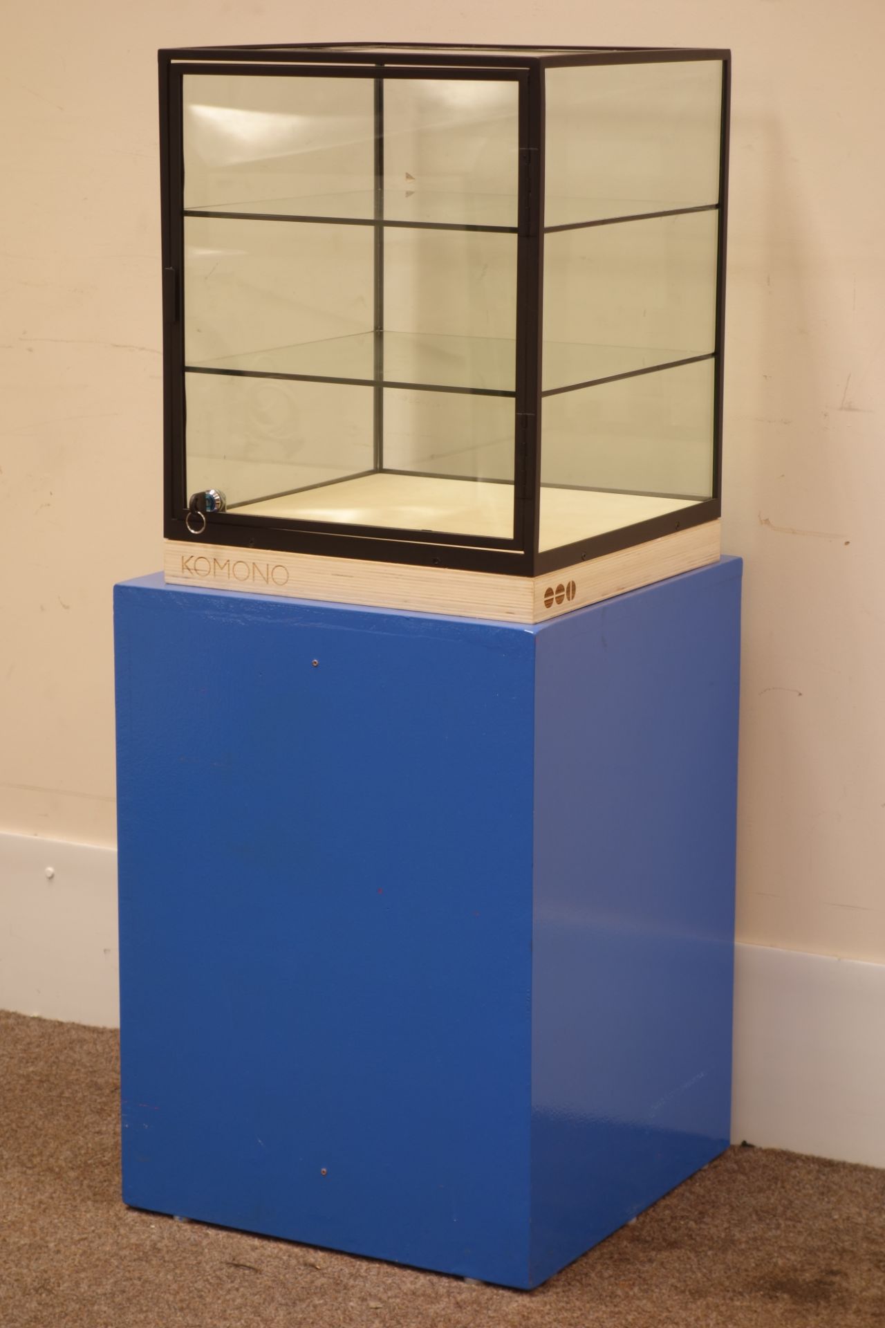 Four glass side display cabinet on blue painted stand, lockable door, 46cm x 46cm,