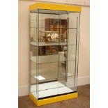 Glazed floor standing shop display cabinet with mirrored back and illuminated interior,