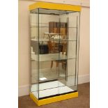 Glazed floor standing shop display cabinet with mirrored back and illuminated interior,