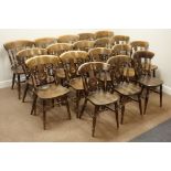 Set eighteen stained beech farmhouse style dining chairs, shaped splat back,