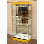 Glazed floor standing shop display cabinet with mirrored back and illuminated interior,