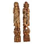 Pair of late 19th century Dutch oak pilasters carved as itinerant musicians,