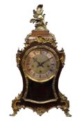 19th century French cartouche shaped mantel clock, with floral ormolu mounts and feet,