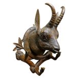 Early 20th century carved black forest hat stand in the form of a mountain goat with glass eyes and