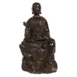 19th century Chinese bronze model of a seated Louhan, wearing flowing robes,