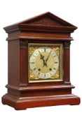 Late 19th century walnut bracket clock, in architectural case with carved frieze,