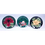 Three Moorcroft circular pin dishes, 'Forest Glade', D11.