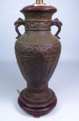 20th century oriental relief cast bronze table lamp, H31.