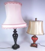 Oriental style table lamp with gilt decoration and a cast metal table lamp,