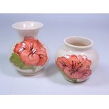 Moorcroft Hibiscus pattern vase with flared neck, H10cm and a matching Moorcroft vase,