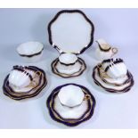 19th/ early 20th Century Coalport tea set for six persons, with waved octagonal rim,