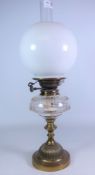 Victorian brass oil lamp with cut glass reservoir, opaque glass shade and funnel,