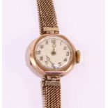 9ct rose gold wristwatch London 1932 on Albion gold bracelet stamped 9ct approx 16.
