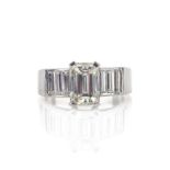 18ct white gold emerald cut and baguette cut diamond ring hallmarked 1.