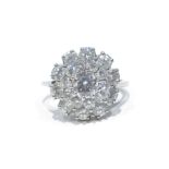 White gold and diamond cluster ring central diamond approx 0.