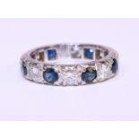 Diamond and sapphire platinum set eternity ring Condition Report <a