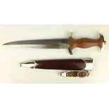 A WWII period German Third Reich SA Dagger, brown wooden handle with inset insignia,