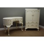 Cream painted kidney shaped dressing table (W105cm, H75cm, D64cm), and matching tallboy (W78cm,